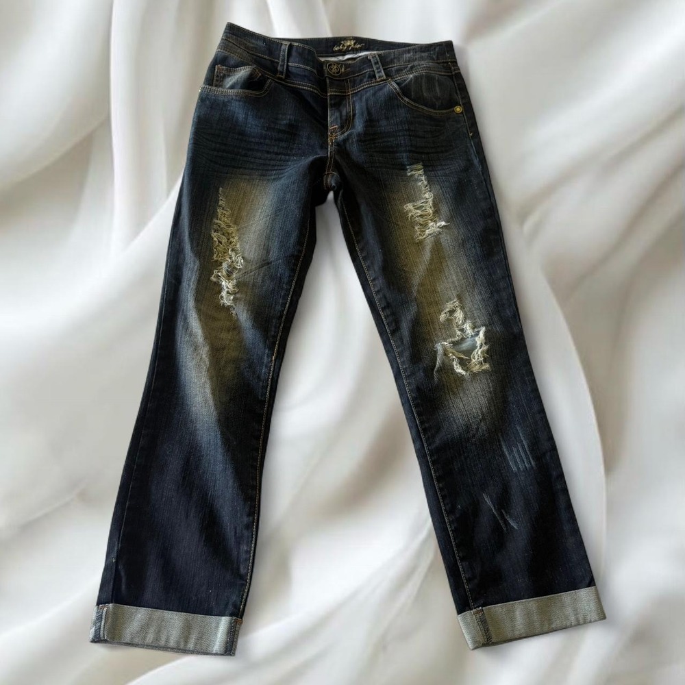 Low-rise Y2K vintage Baby Phat denim jeans distressing